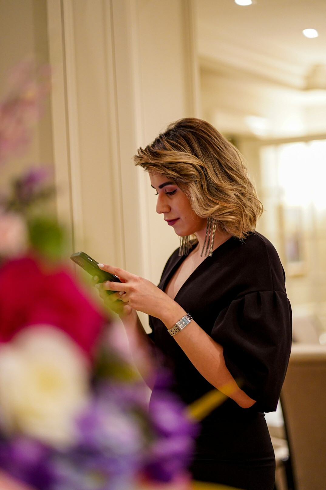 Professional woman reviewing data on a tablet