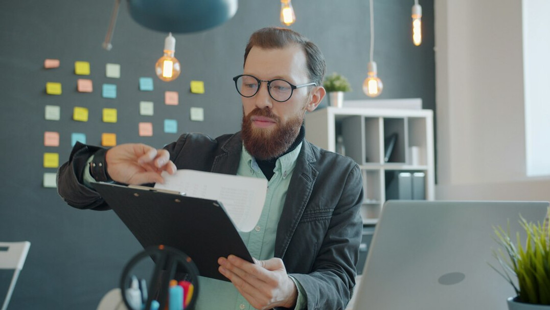 businessman at desk with documents